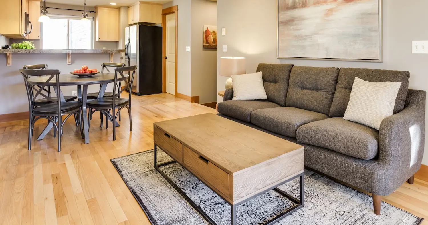 Bright furnished living room with a sofa