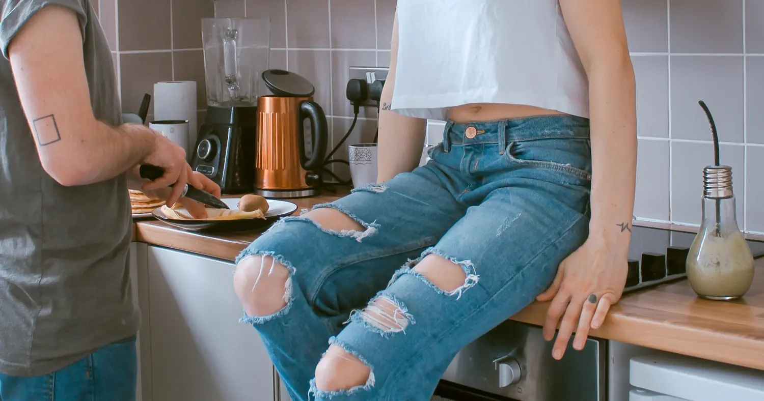 Flatmates together in a shared kitchen