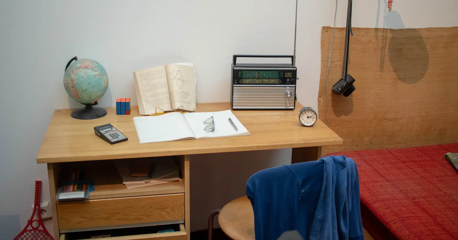 Student room with a bed and a desk